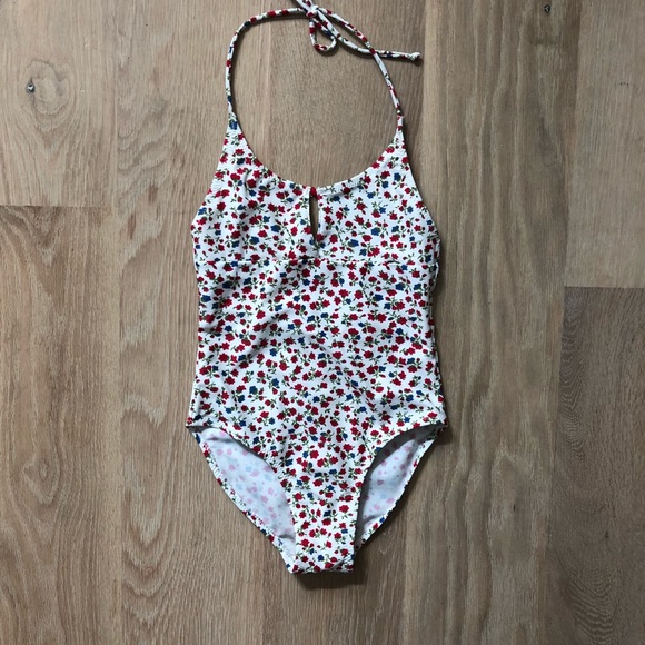 Are you reached home meaning in tamil O que é swimsuit em inglês